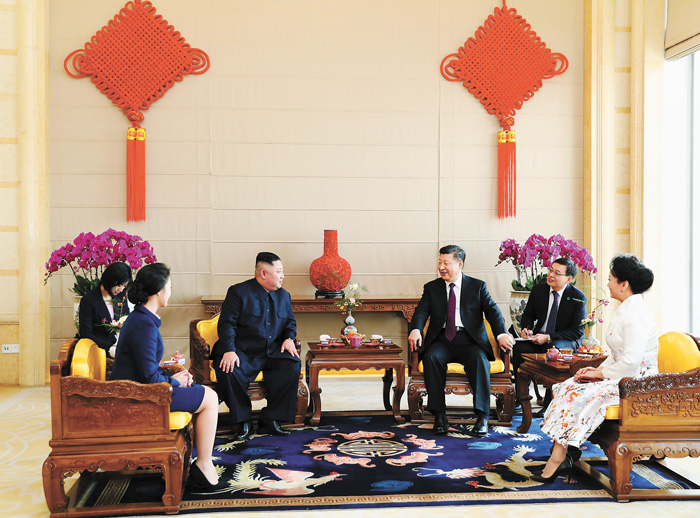 習近平夫婦在北京飯店會見金正恩夫婦。新華社