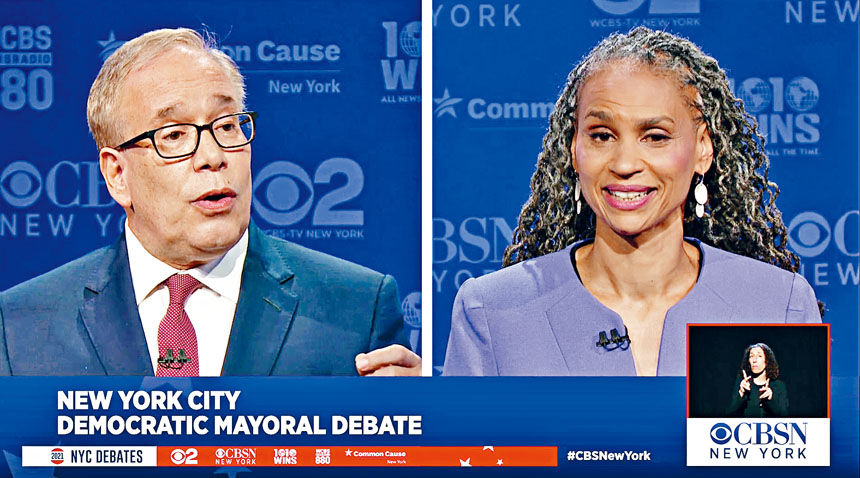 威利與斯靜格(左)在取消市警佩槍的立場上形成對比。WCBS-TV via The New York Times圖片